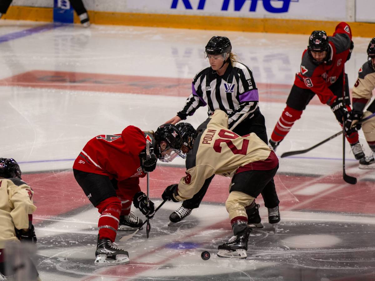 Marie-Philip Poulin wins the opening faceoff of Tuesday's PWHL game