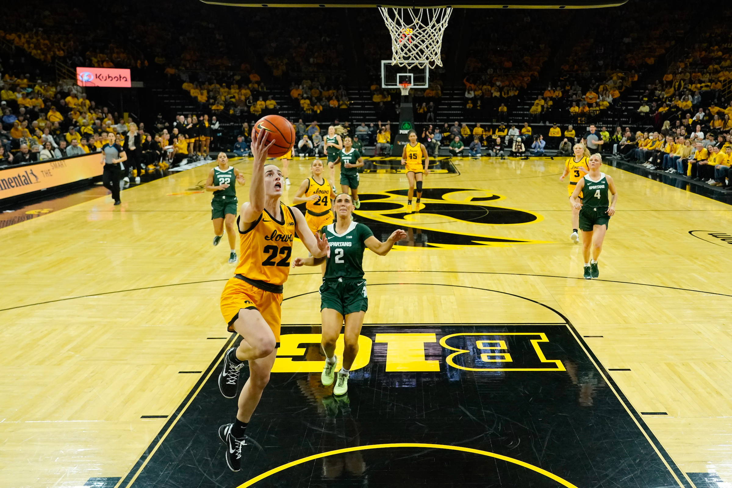 Iowa's Caitlin Clark attempts a layup against Michigan State.