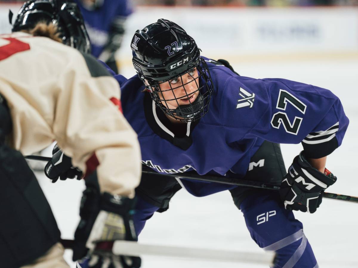 Taylor Heise of Minnesota lines up for a faceoff