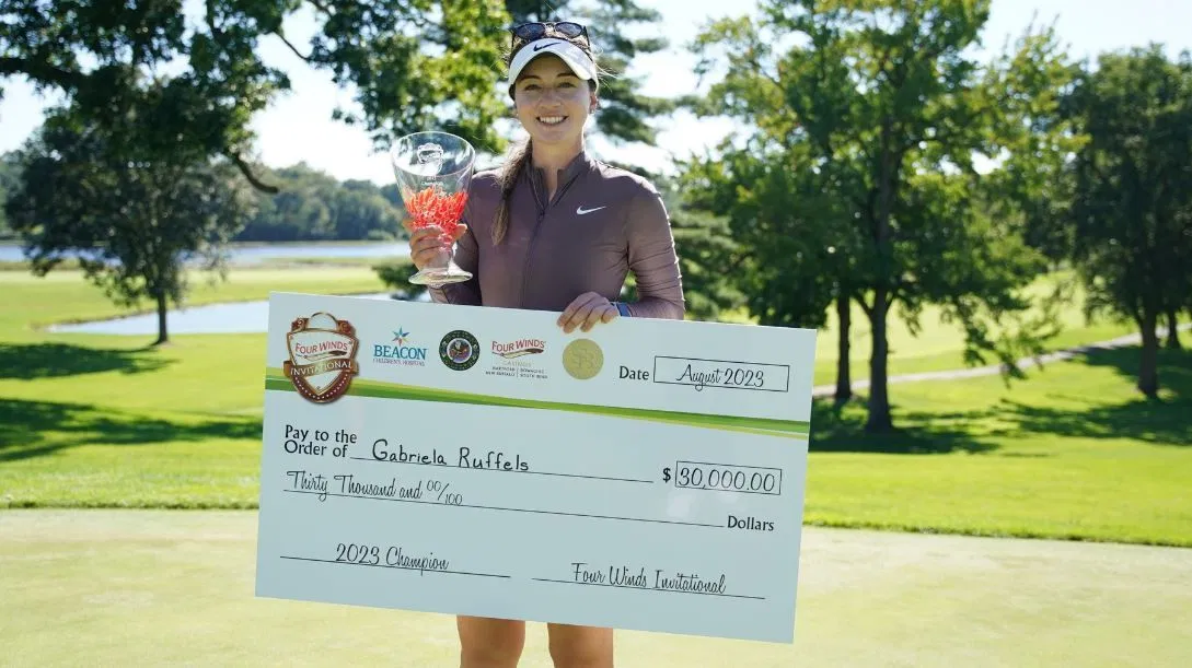 Gabi Ruffles poses with her check after winning the 2023 Four Winds Invitational.
