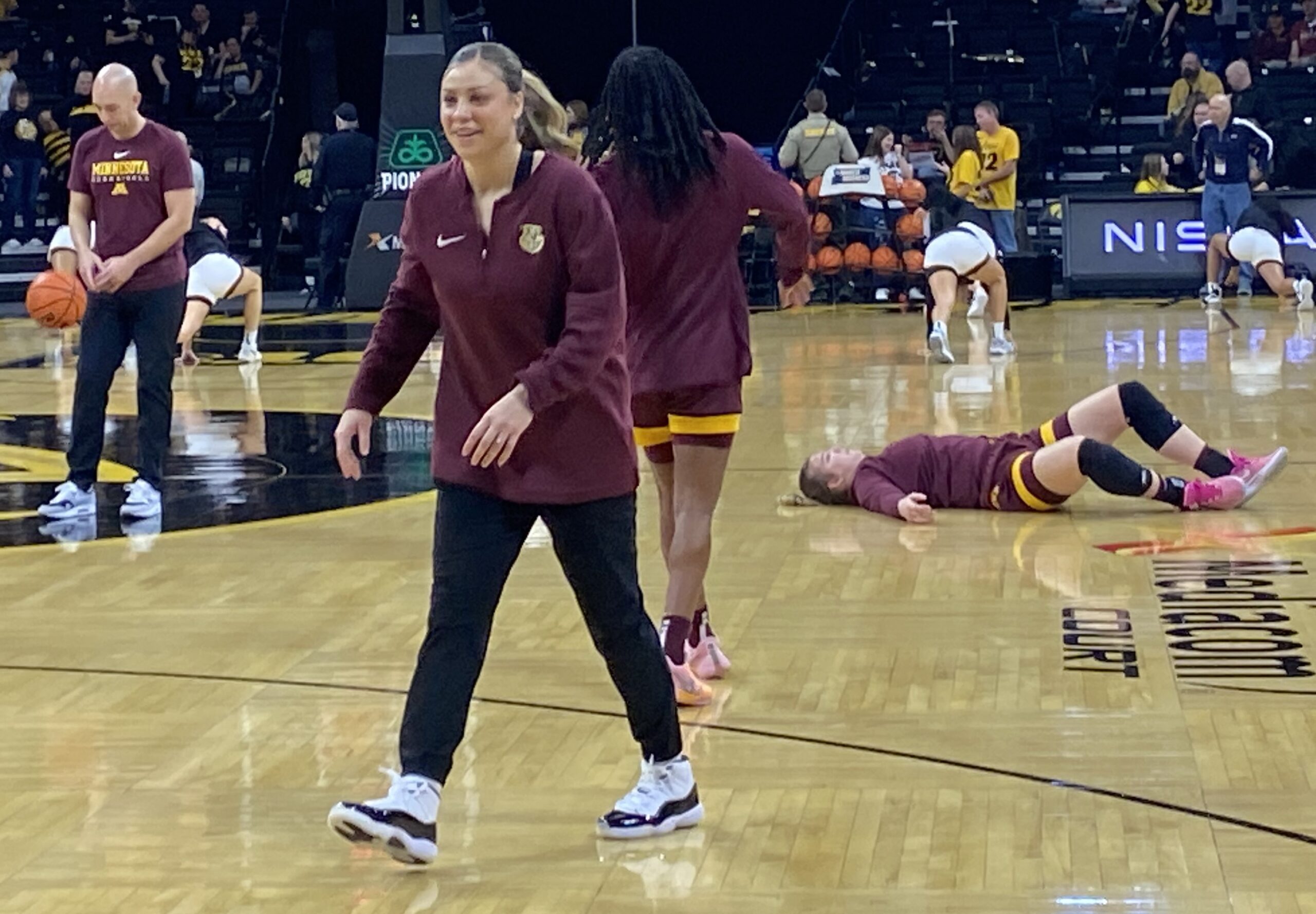 Rachel Banham coaches with the Minnesota Lynx