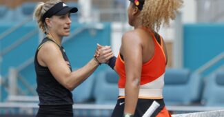 Mar 24, 2022; Miami Gardens, FL, USA; Naomi Osaka (JPN) (R) shakes hands with Angelique Kerber (GER) (L) after their second round women's singles match in the Miami Open at Hard Rock Stadium. Mandatory Credit: Geoff Burke-USA TODAY Sports