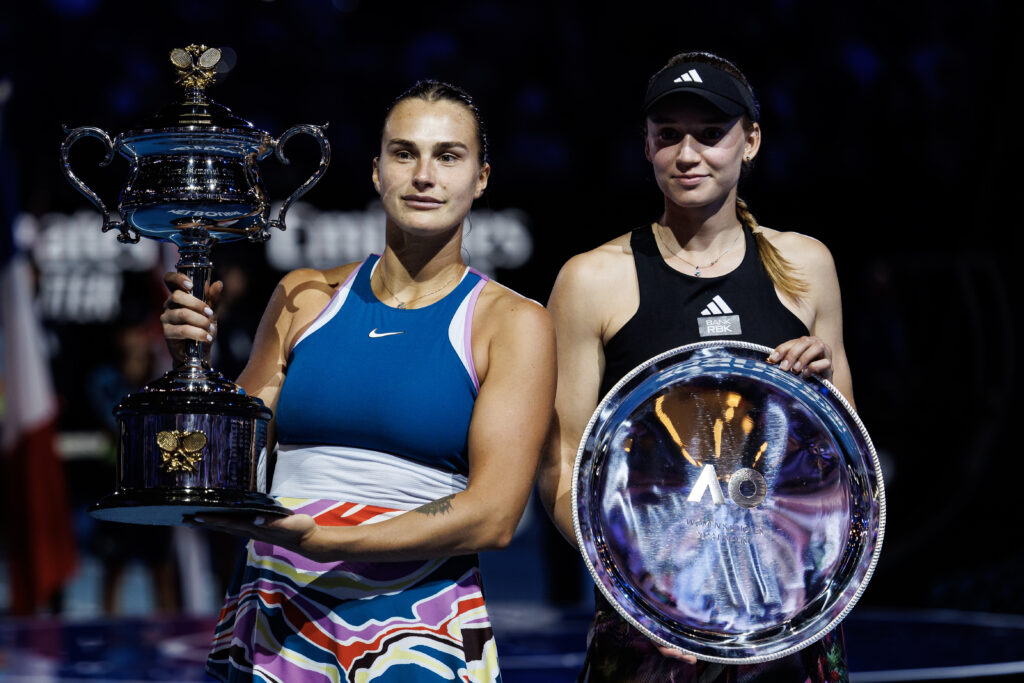 Jan 28, 2023; Melbourne, Victoria, Australia; Aryna Sabalenka of Belarus and Elena Ribakina of Kazakhstan pose with their trophies after the women’s singles final in the women’s singles final on day thirteen of the 2023 Australian Open tennis tournament at Melbourne Park. Mandatory Credit: Mike Frey-USA TODAY Sports