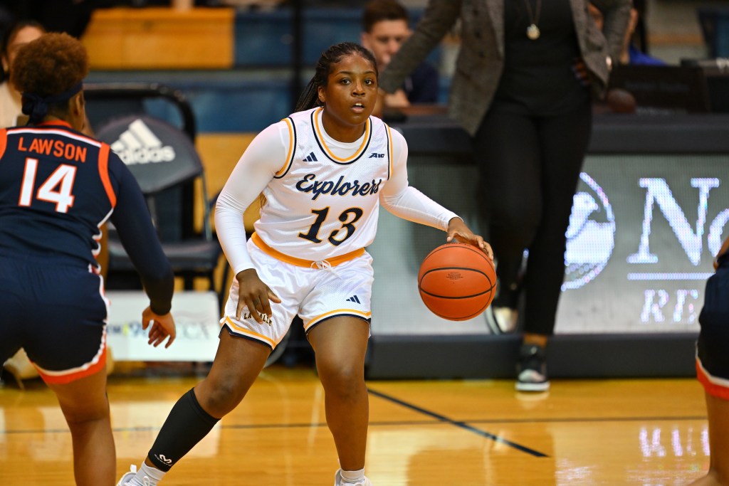 La Salle's Makayla Miller dribbles the ball with her left hand and looks to dribble against Virginia.