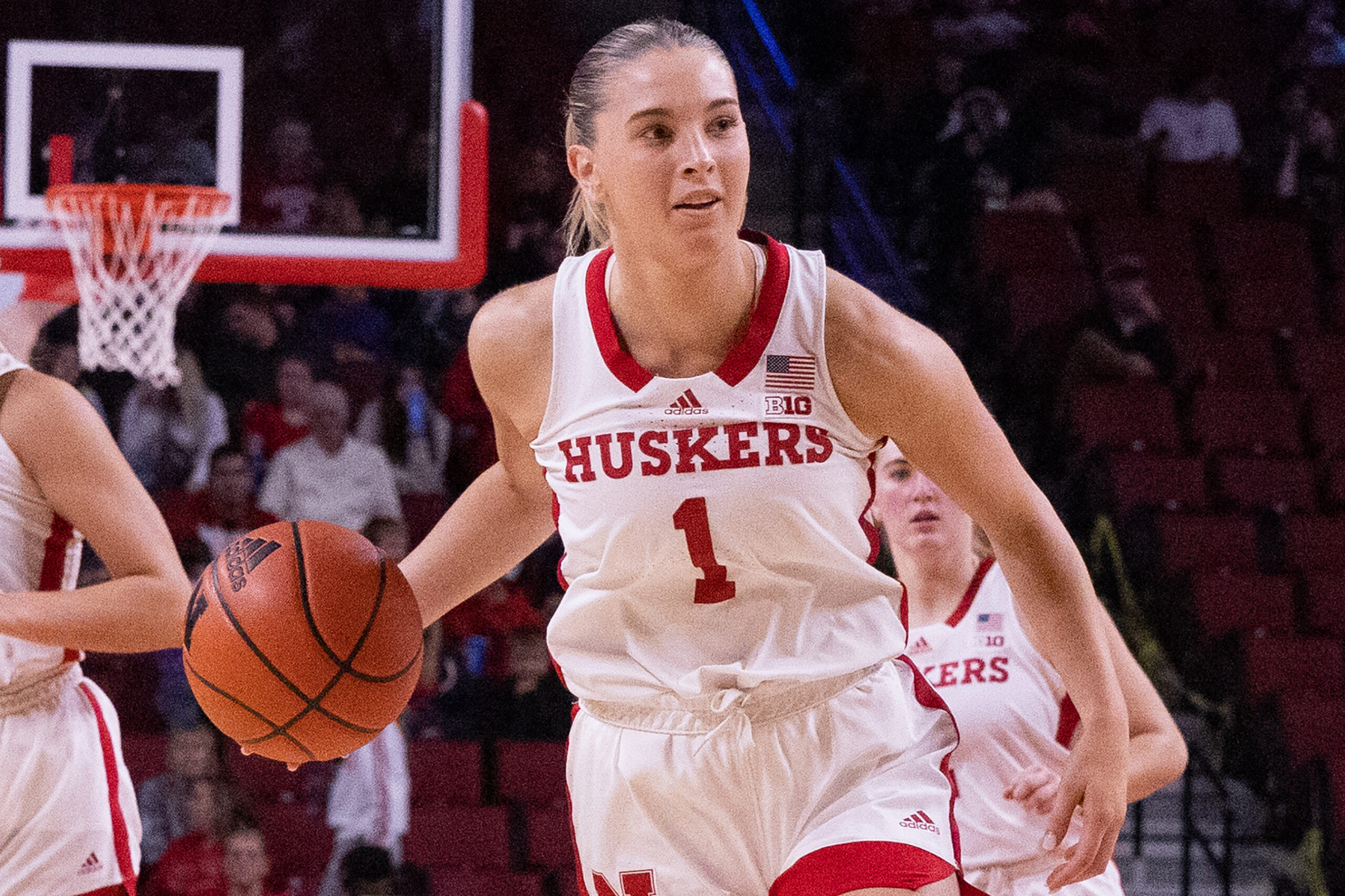 Jaz Shelley dribbles the ball up the floor for Nebraska.