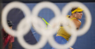 Elina Svitolina in the background of the Olympic Rings