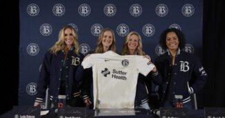 Bay FC co-founders pose for a photo with a team jersey at the club's inaugural kit announcement. Beattie