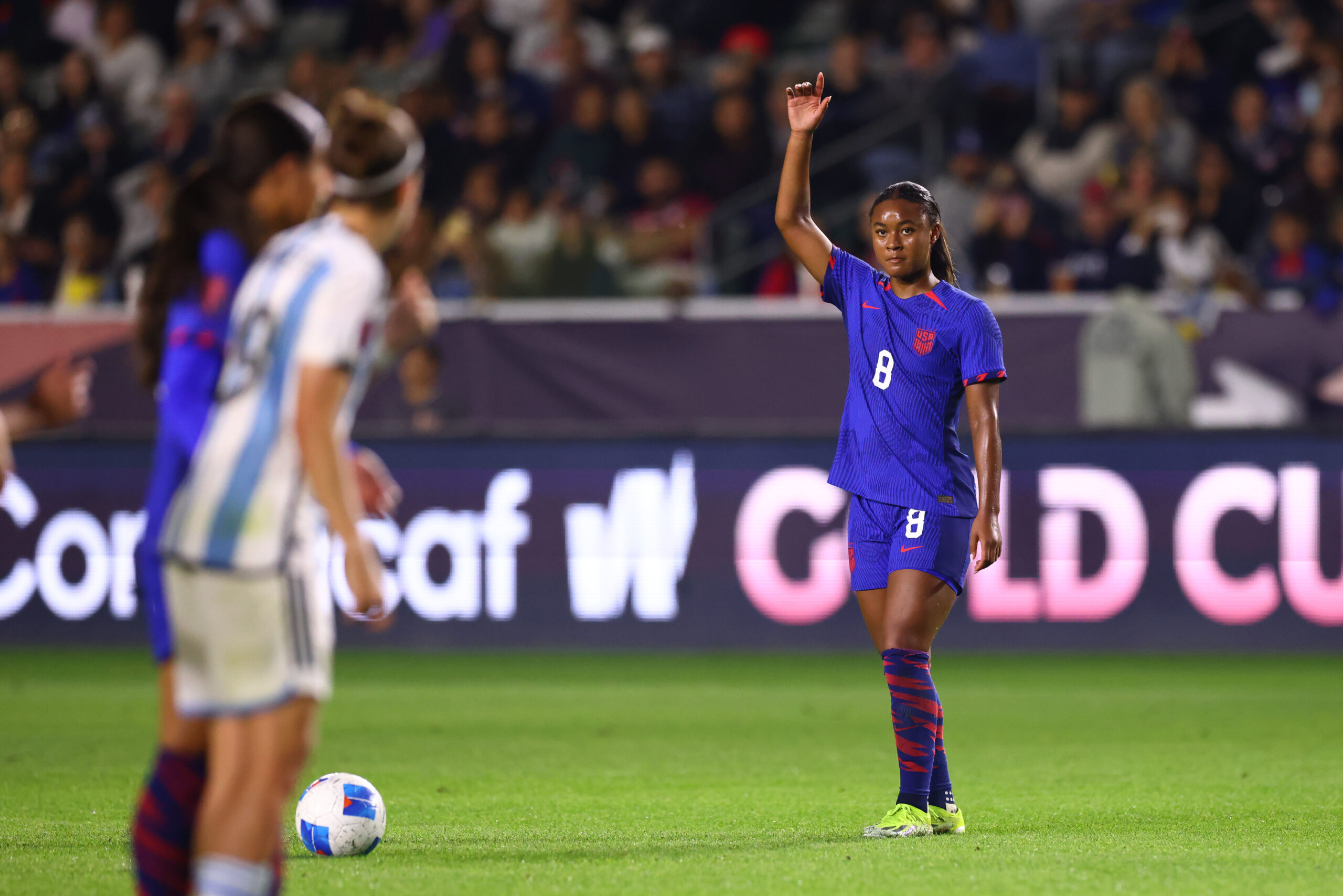 Jaedyn Shaw raises her hand before taking a kick against Argentina during the CONCACAF W Cup
