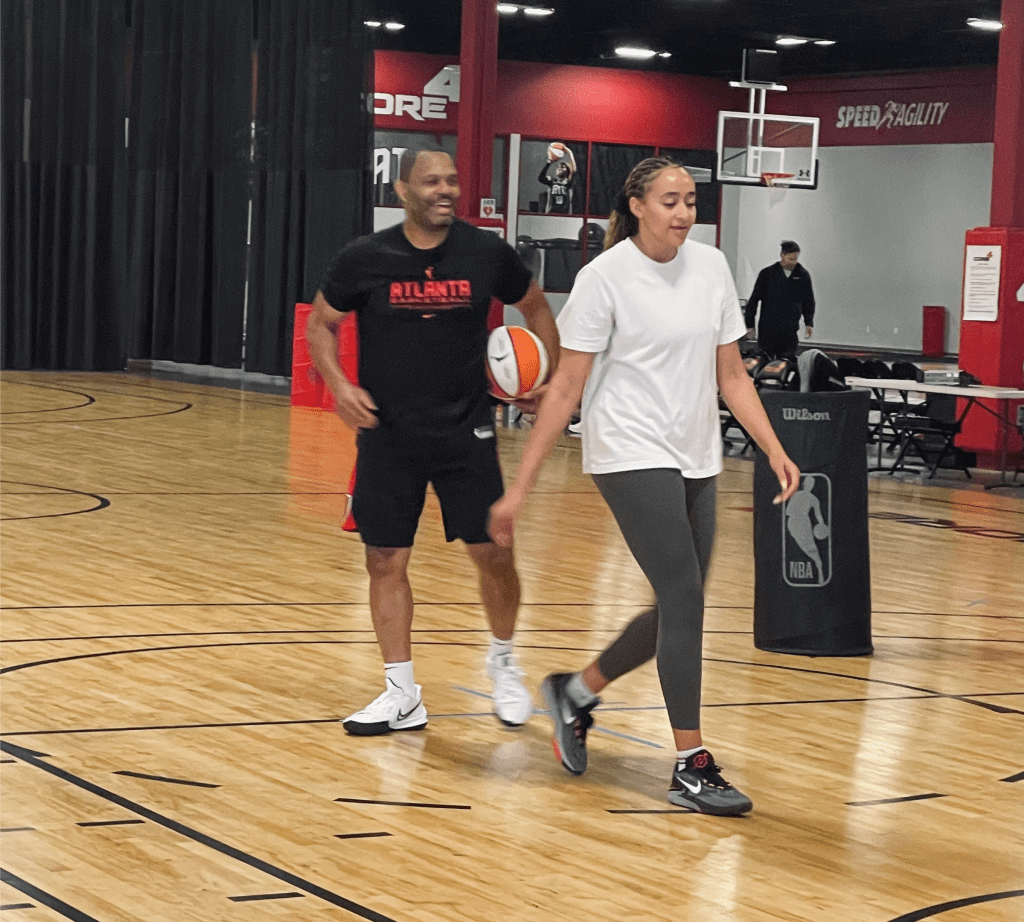 Atlanta Dream player development coach Dale McNeil pictured working with Haley Jones