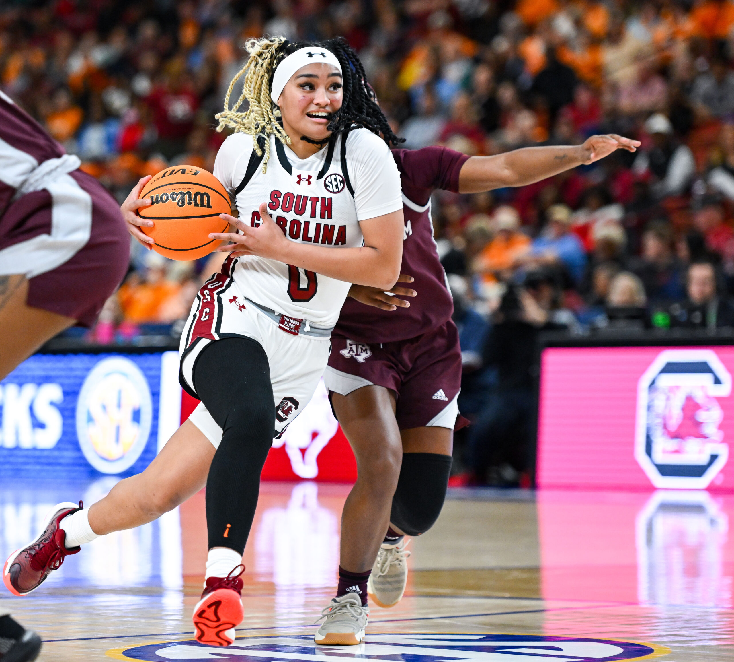 South Carolina guard Te-Hina Paopao gathers the ball on the right side of her body as she gets a step on her defender.
