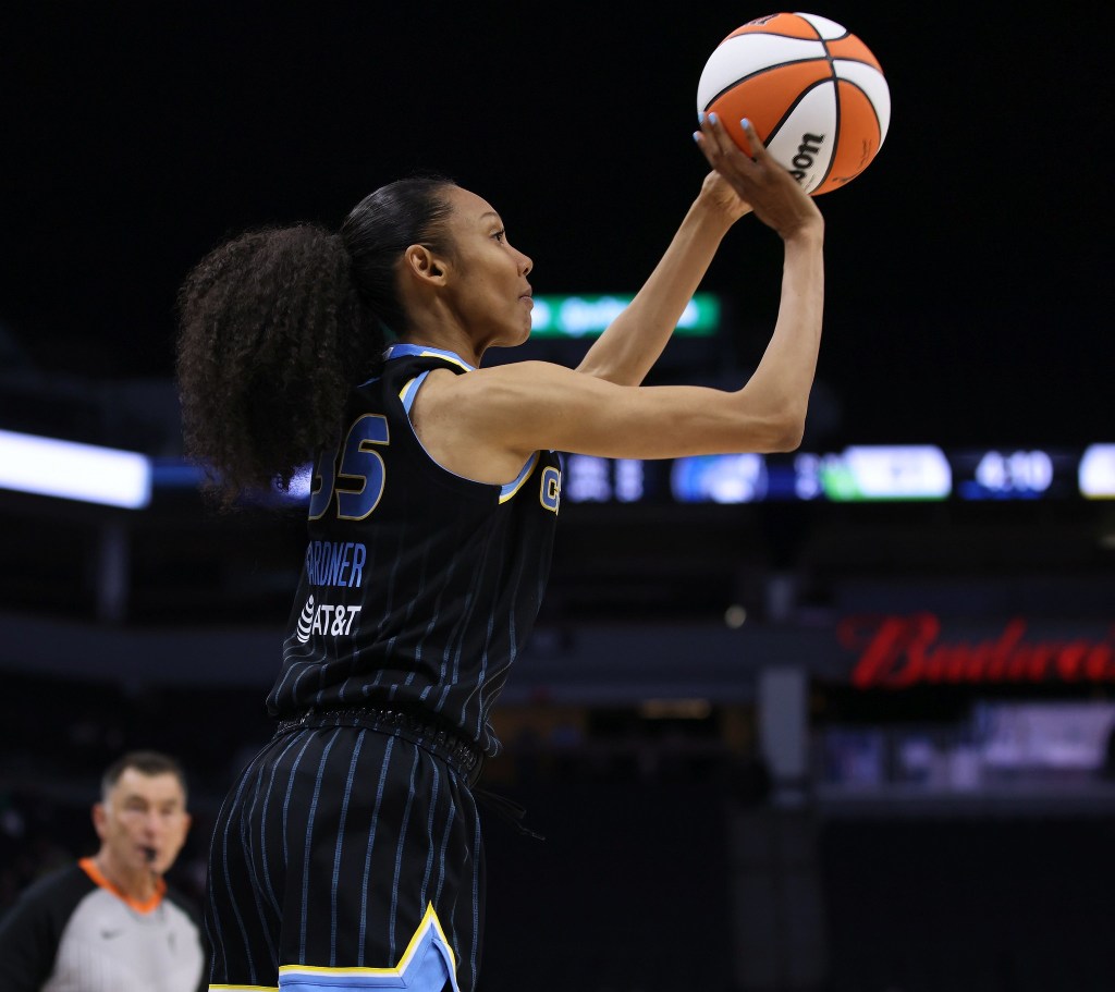 Rebekah Gardner shoots the basketball.