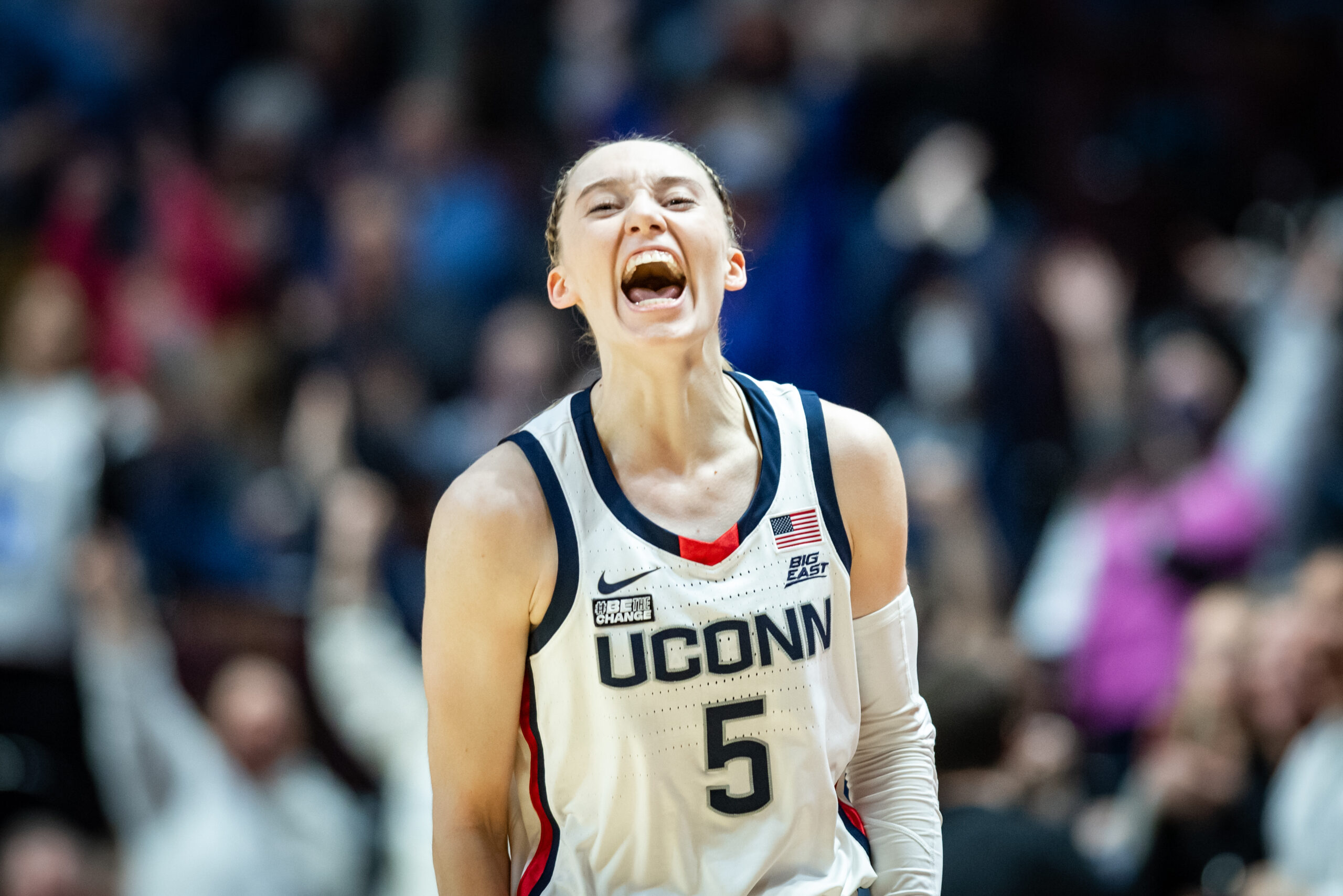 Paige Bueckers yells a celebratory yell.