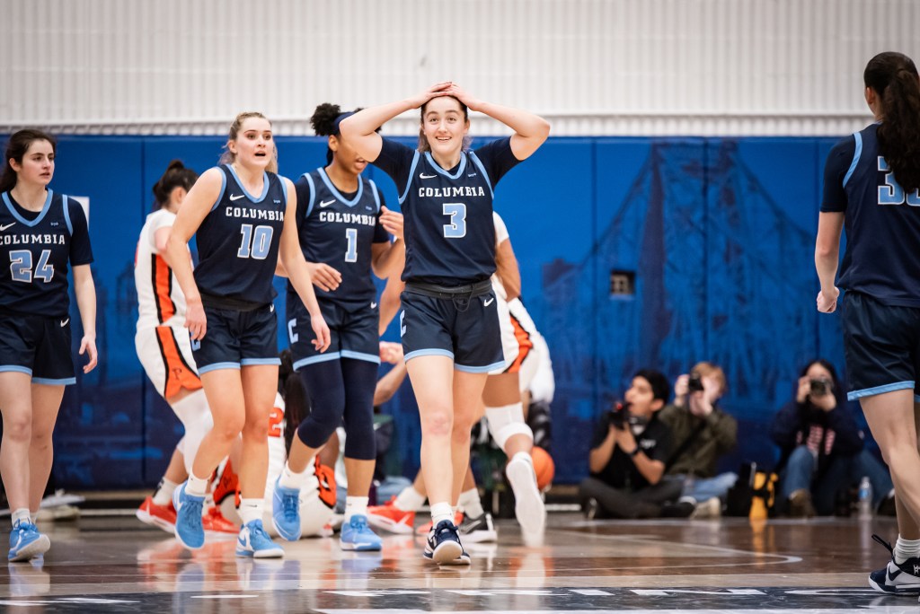 Columbia guard Cecelia Collins puts her hands on top of her head and half-smiles during a frustrating game for the Lions.