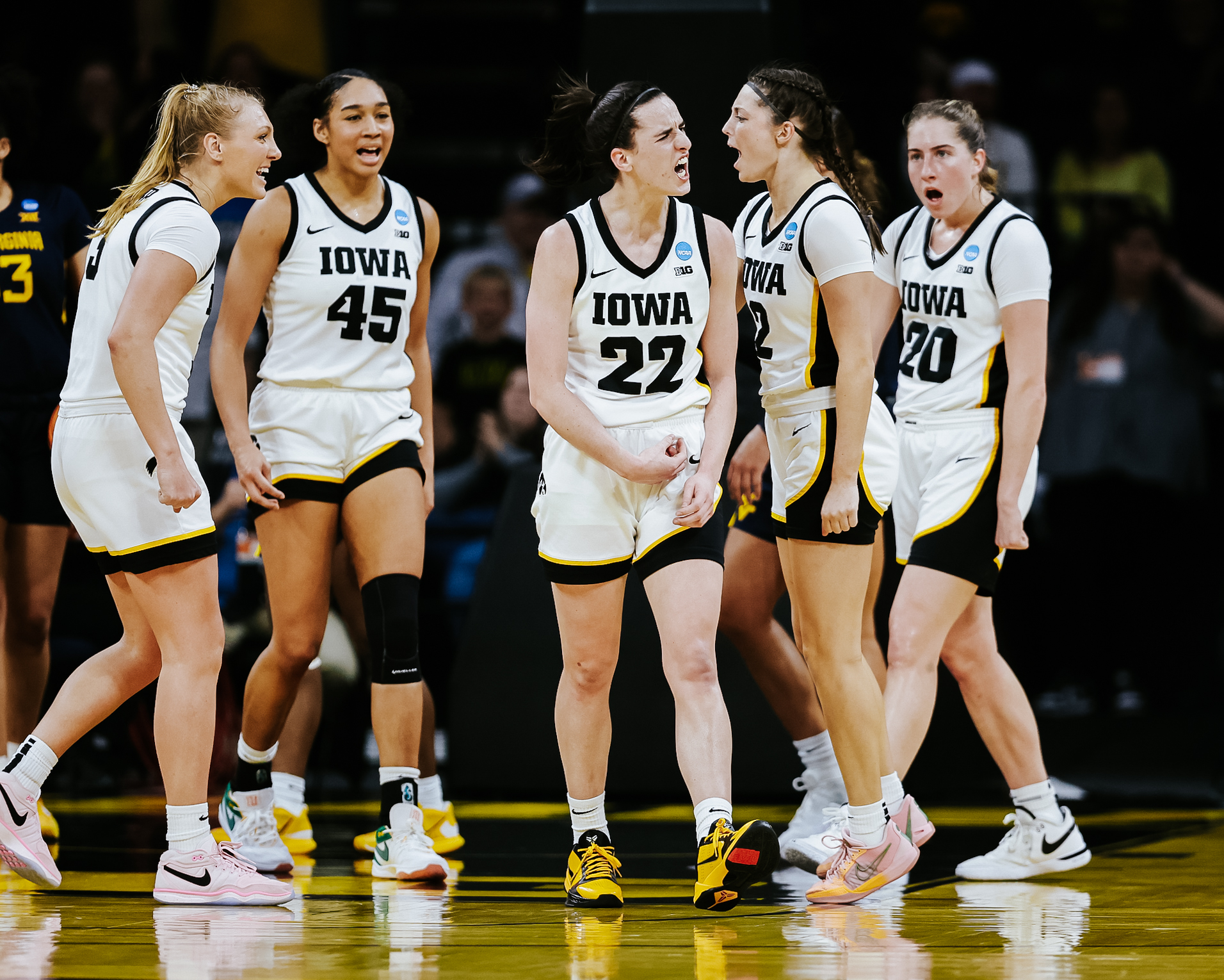 Iowa guard Caitlin Clark and teammates