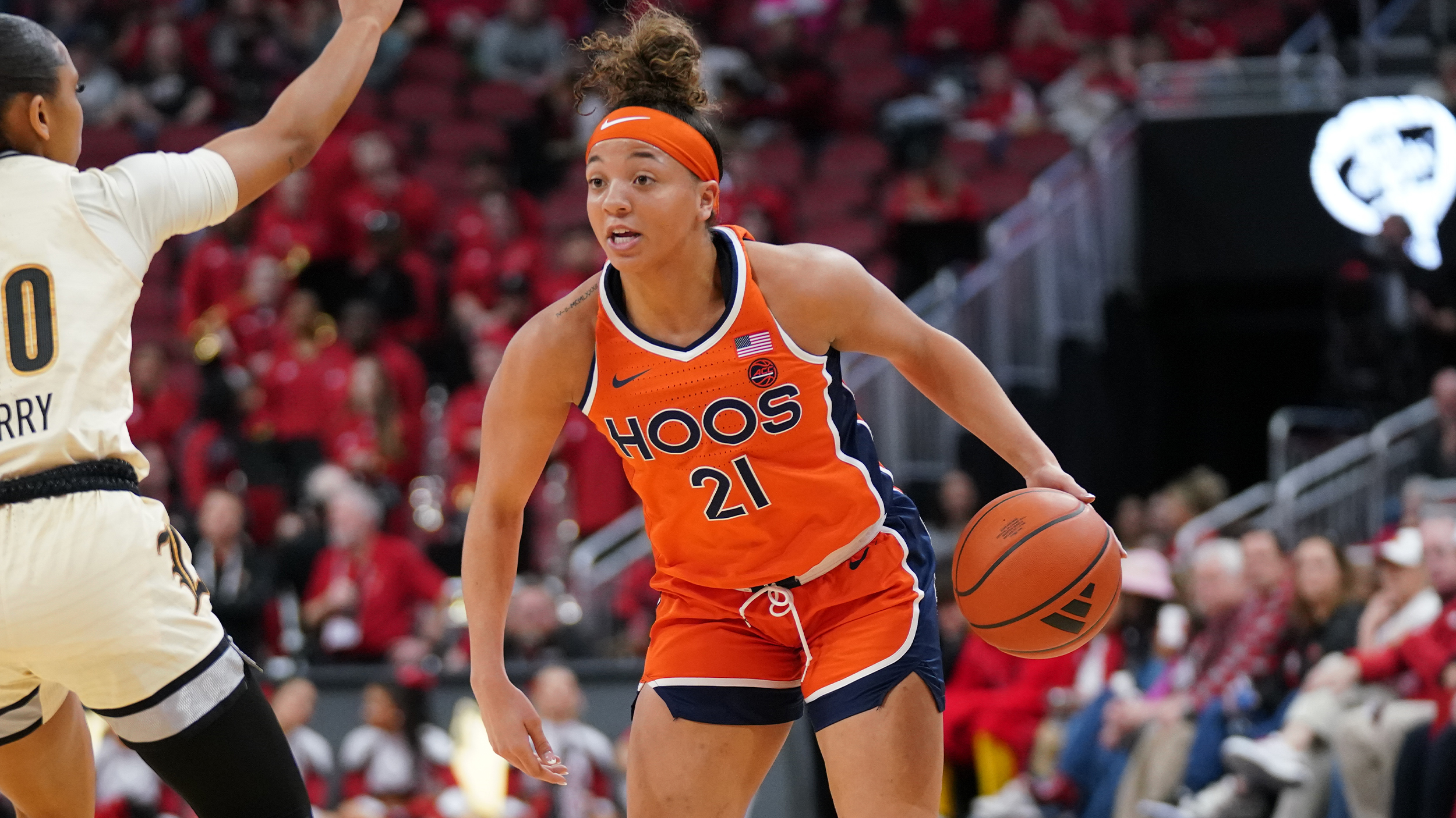Virginia freshman Kymora Johnson dribbles the basketball