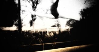 Kathy Johnson Clarke as a young gymnast on her backyard beam