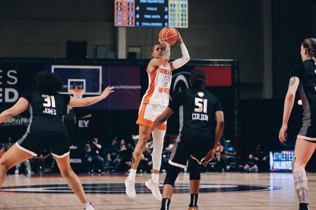 Natasha Cloud shoots over Sydney Colson in Athletes Unlimited action