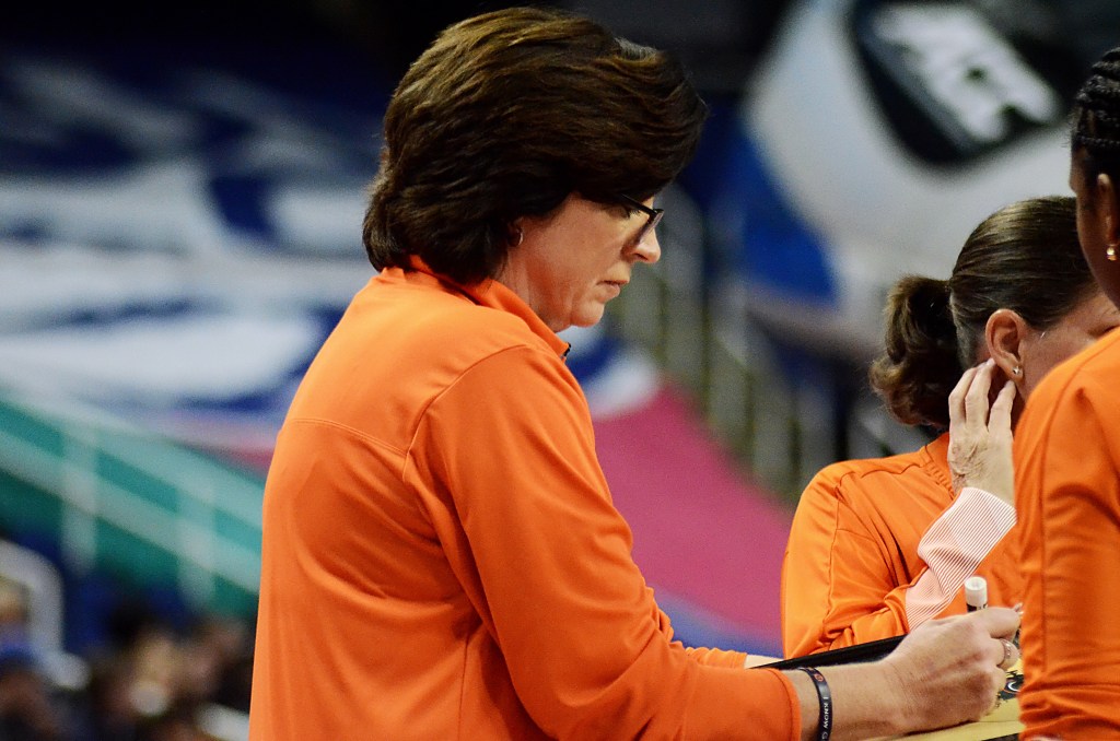 Miami coach Katie Meier draws up a play during a timeout in the 2022 ACC Tournament