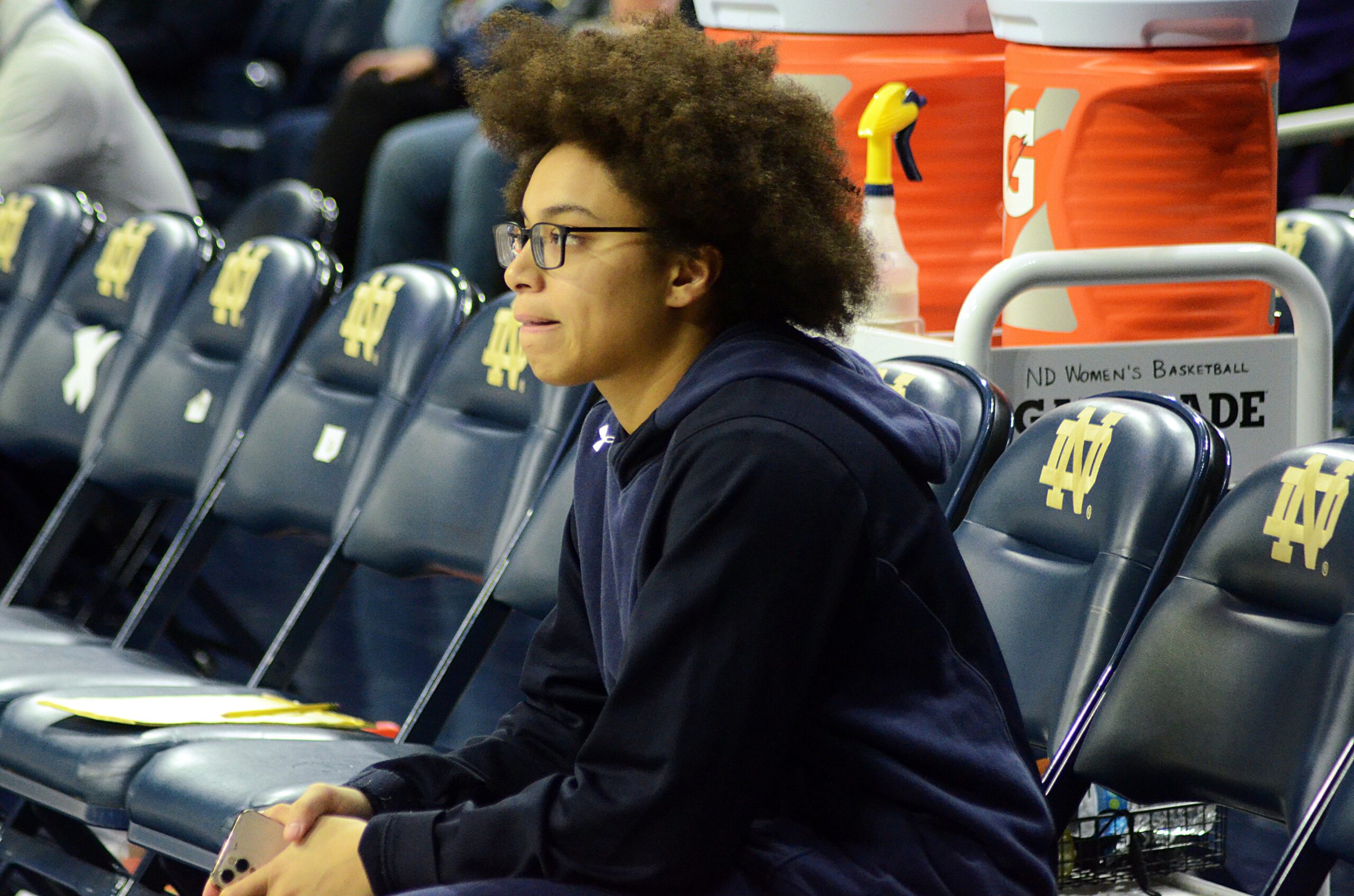 Notre Dame guard Olivia Miles sits on the bench at Purcell Pavilion ahead of the Irish's Jan. 7, 2024 game against UNC. (Mitchell Northam / The Next)