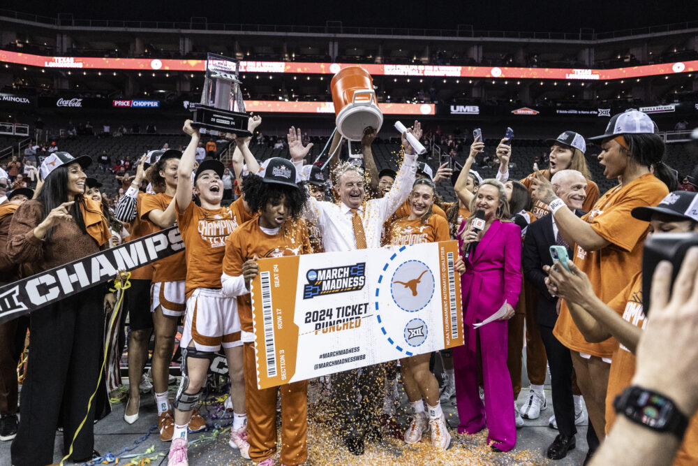 The Texas women's basketball celebrates winning the Big 12 title on March 13.