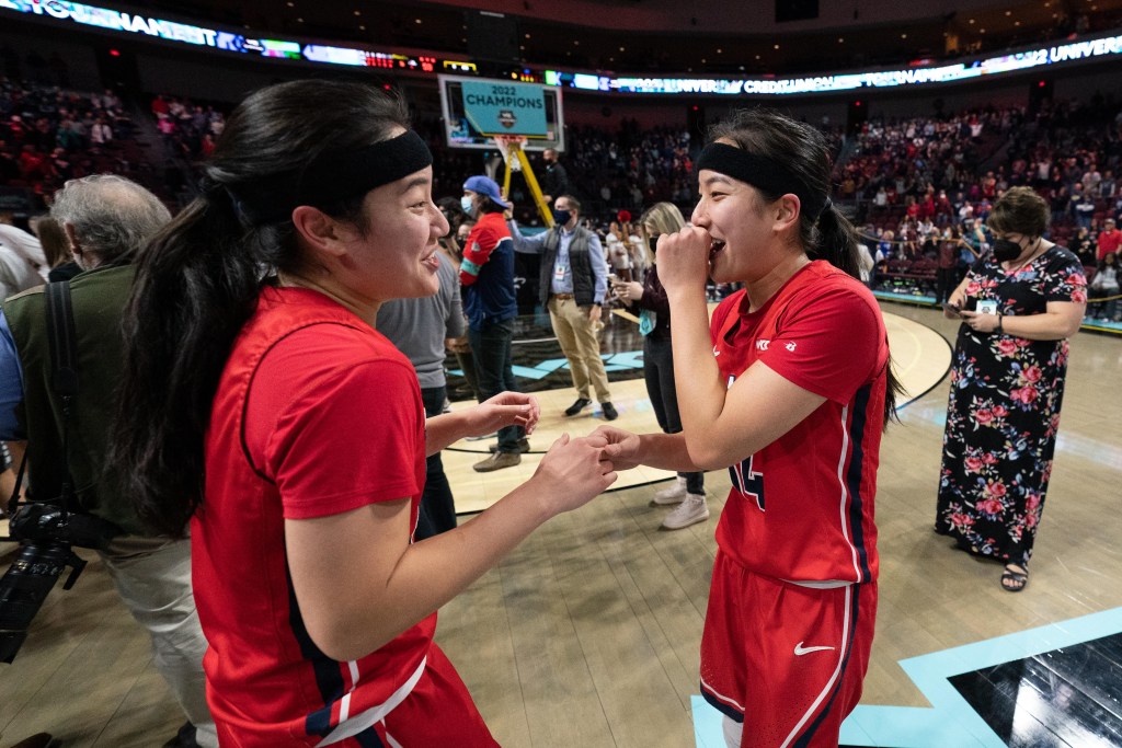 Sweet 16: Kayleigh Truong (11) and guard Kaylynne Truong (14) celebrate