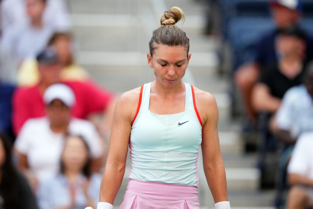 Simona Halep looking down during her last professional match at the 2022 US Open.