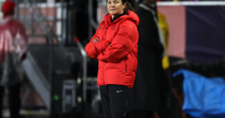 Twila Kilgore stands with her arms crossed