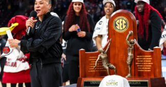 Feb 22, 2024; Columbia, South Carolina, USA; South Carolina Gamecocks head coach Dawn Staley speaks to the crowd after clinching a share of the SEC regular season title after defeating the Alabama Crimson Tide at Colonial Life Arena. Mandatory Credit: Jeff Blake-USA TODAY Sports