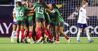 Mexico forward Mayra Pelayo celebrates with her teammates