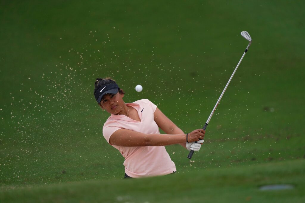 Amari Avery hitting out of a bunker during a practice round at the Augusta National Women's Amateur.