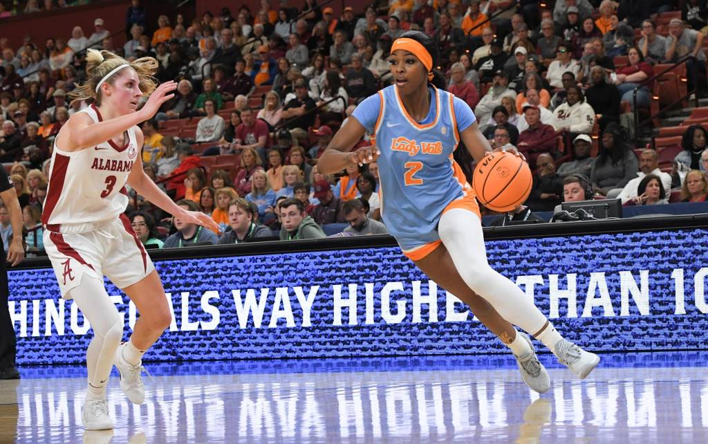 Tennessee forward Rickea Jackson (2) drives to the basket near Alabama guard Sarah Ashlee Barker (3) during the SEC Women's Basketball Tournament.