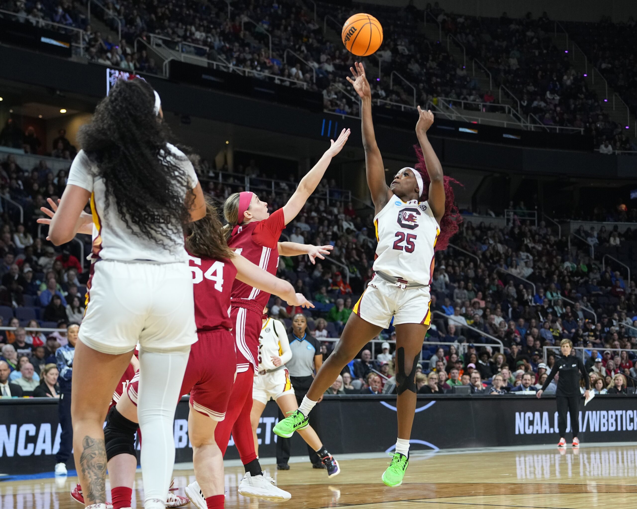 Raven Johnson of South Carolina shoots against Indiana in Albany.
