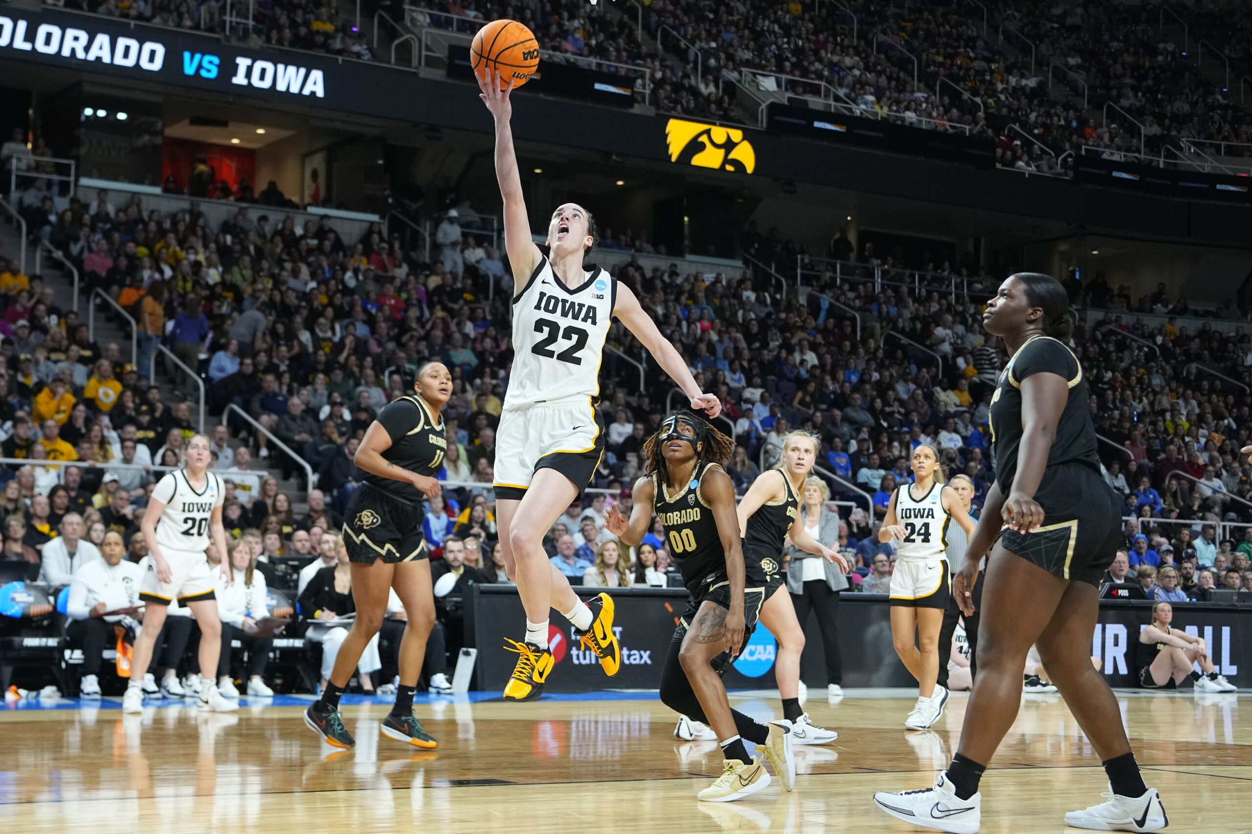 Caitlin Clark elevates for a layup in a Sweet 16 game against Colorado.