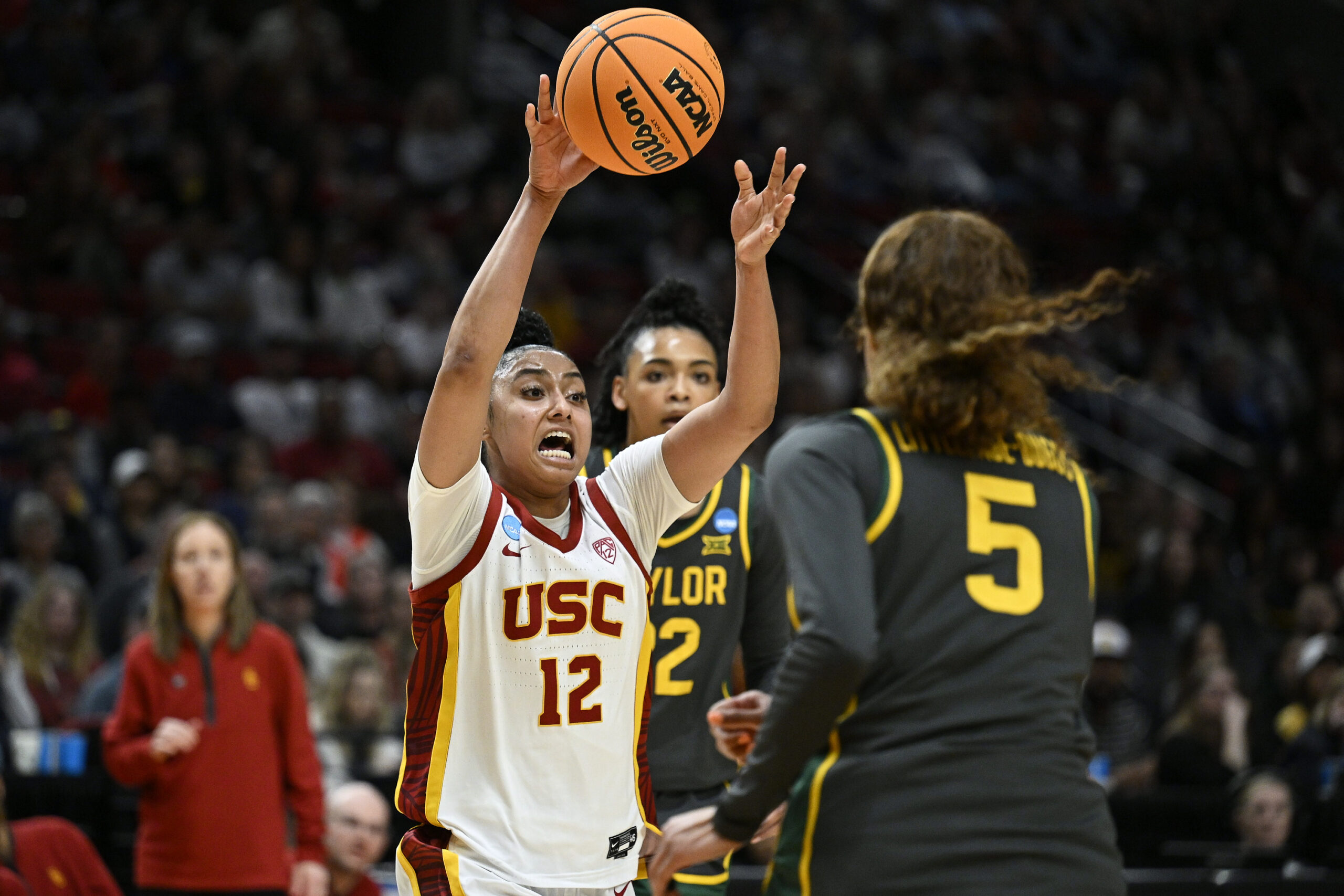 USC Trojans guard JuJu Watkins (12) passes the ball during the second half against Baylor Lady Bears guard Darianna Littlepage-Buggs (5)