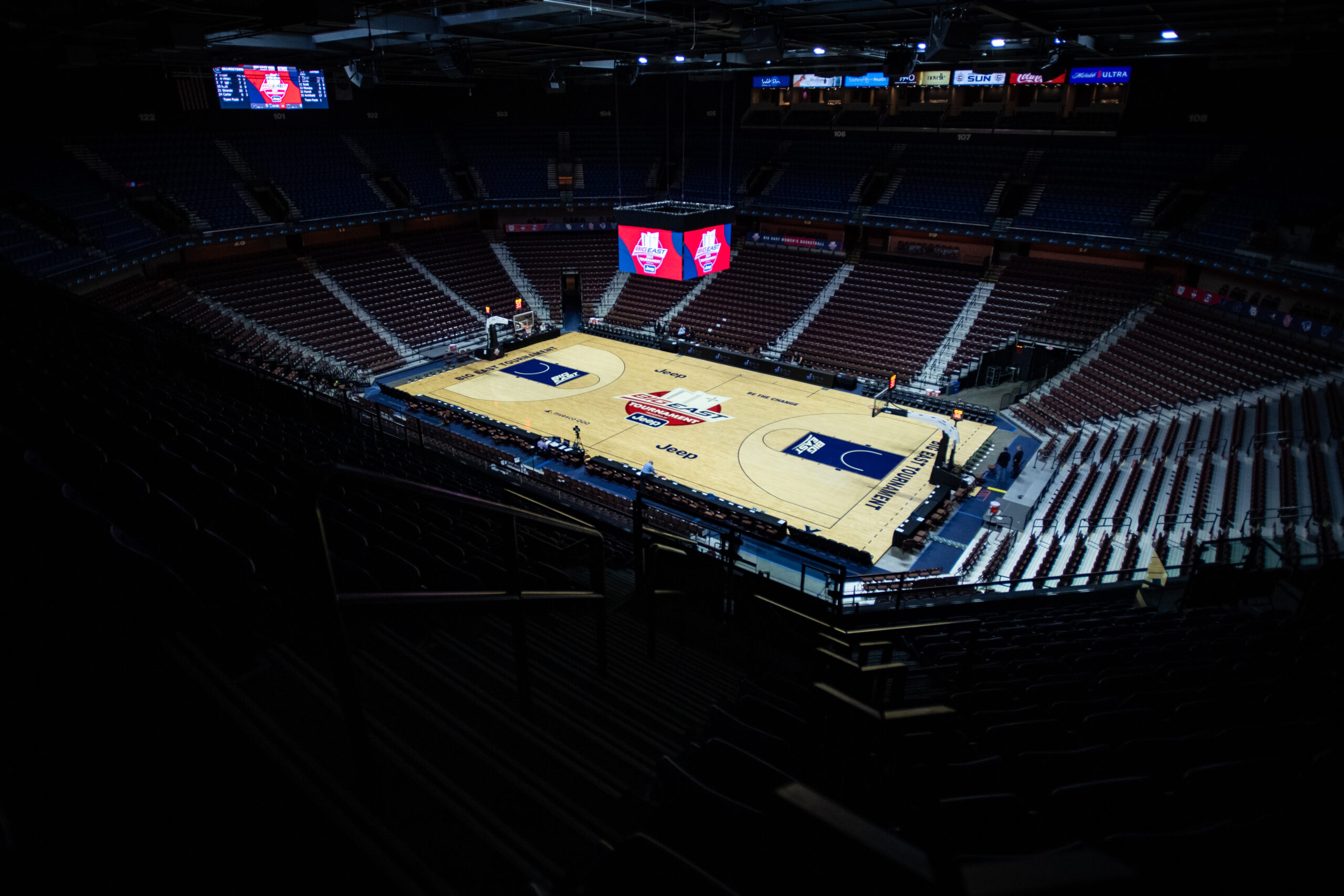 Looking down from the nosebleeds into a completely empty basketball court.
