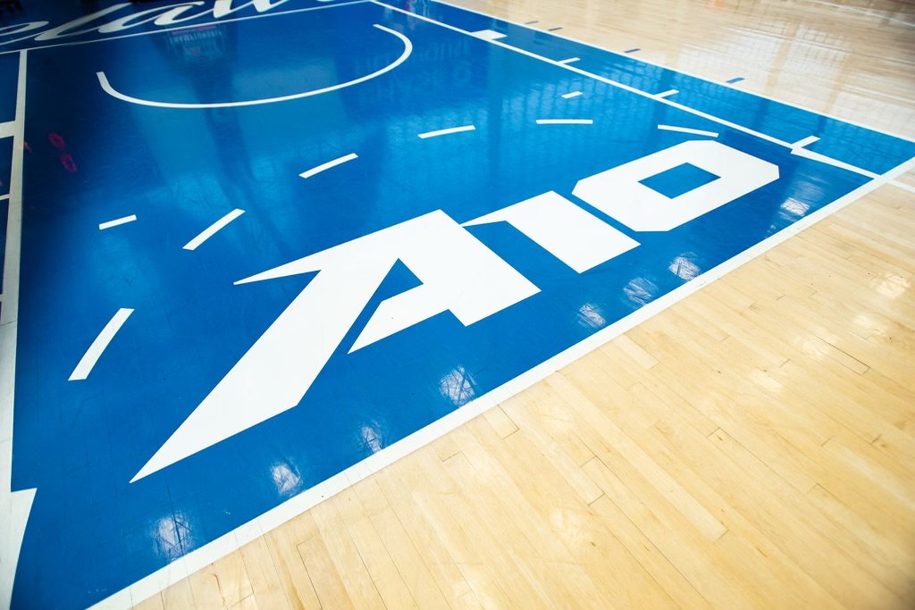 White A-10 logo on a blue background located in the "paint."