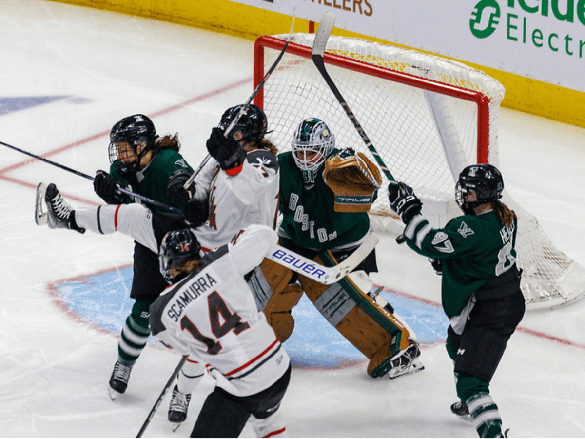 Two Boston players battle two Ottawa players for positioning in front of Frankel. Boston is in green, Ottawa in white.