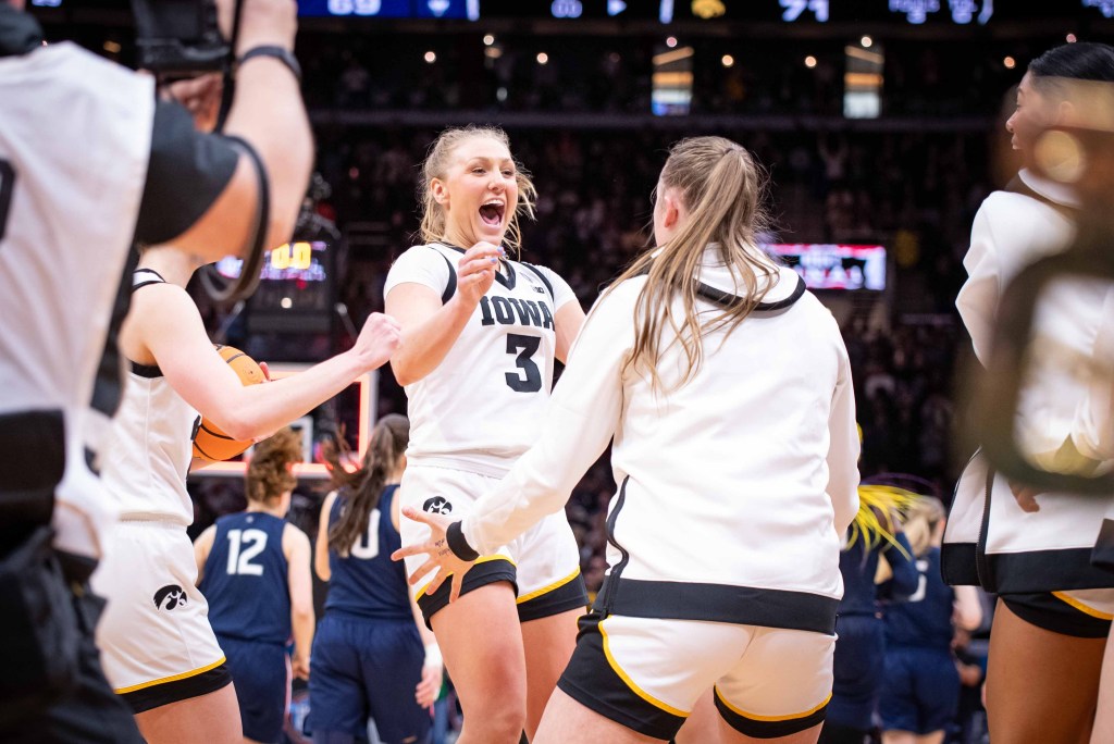 Sydney Affolter (3) celebrates after Iowa beat UConn in the Final Four at Rocket Mortgage Fieldhouse in Cleveland on April 5, 2024. (Photo credit: Domenic Allegra | The Next)