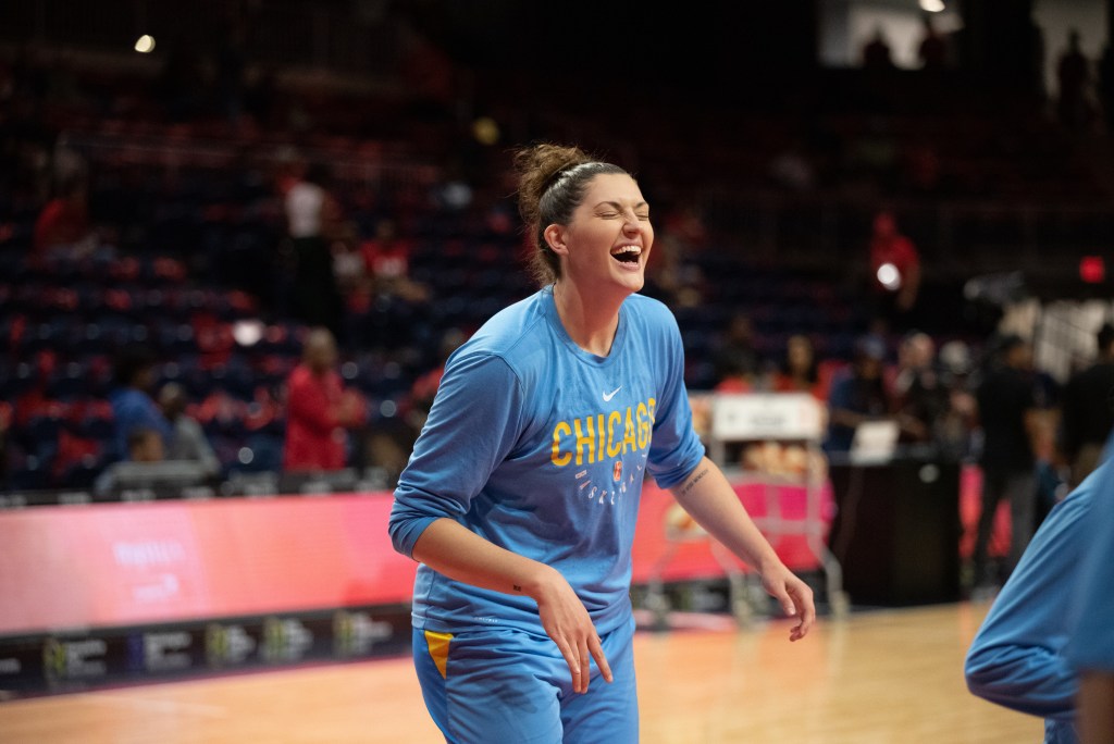Chicago Sky center Stefanie Dolson's eyes close as she laughs during warmups.