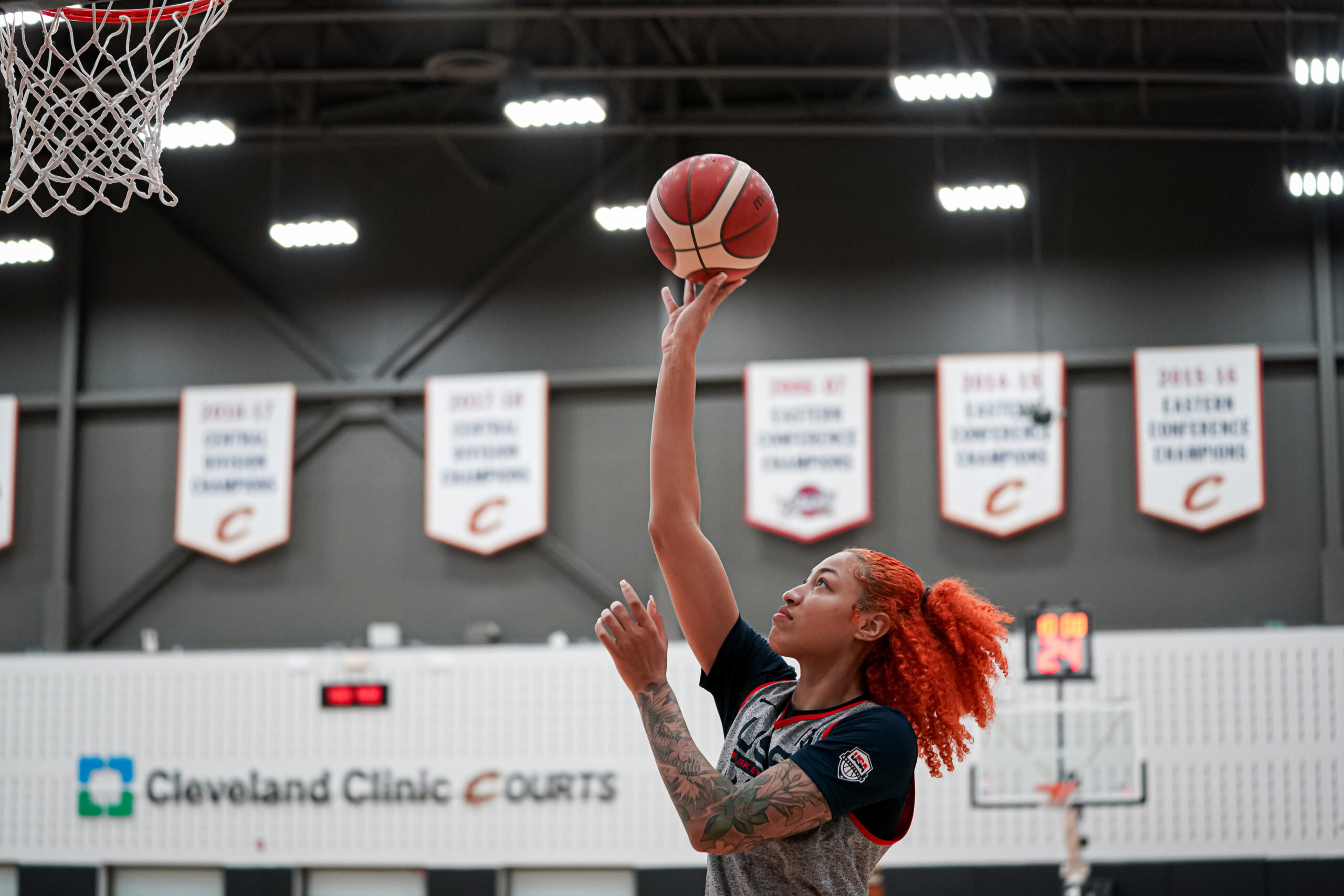 Team USA center/forward Shakira Austin shoots a close-range shot with her right hand.