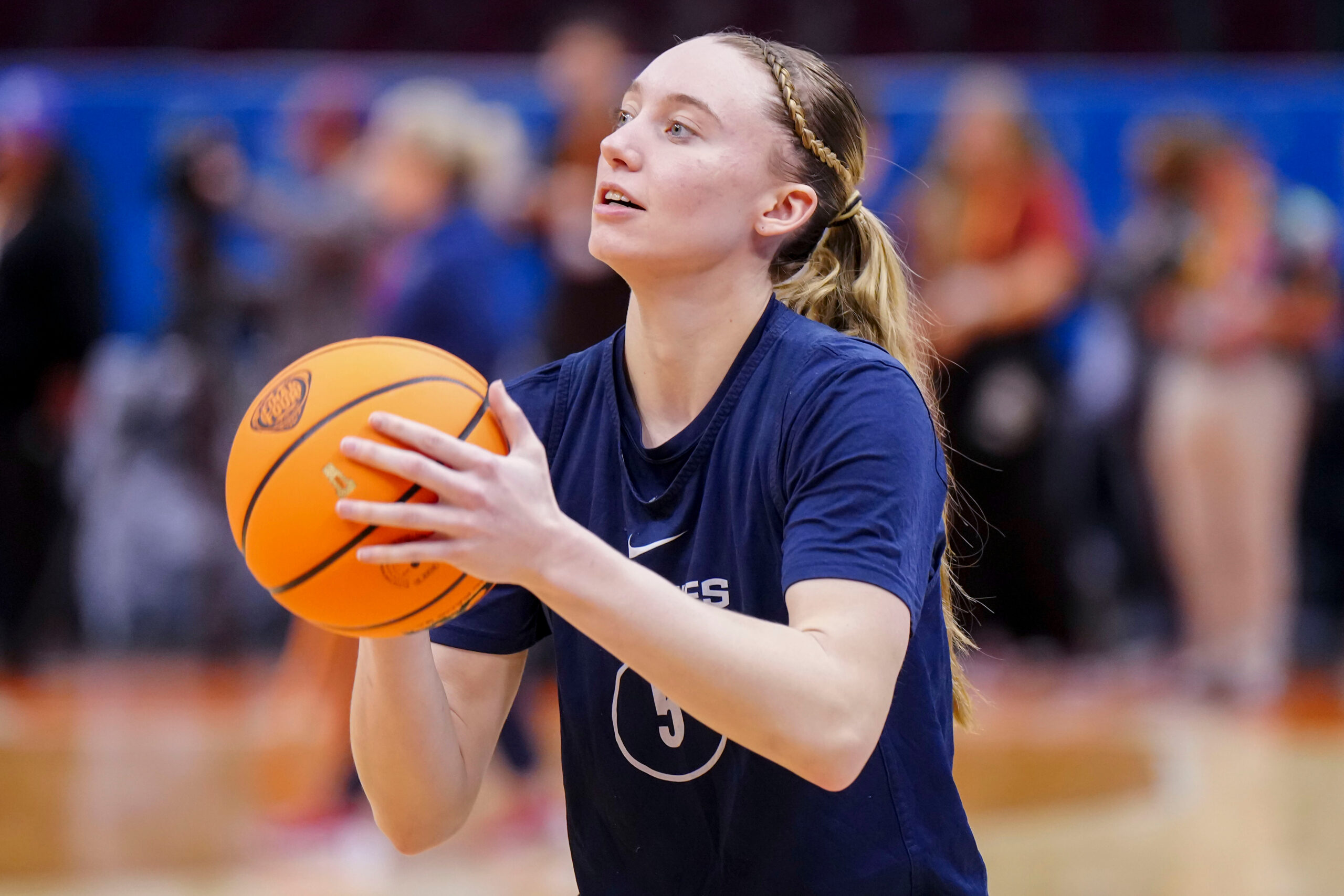 UConn guard Paige Bueckers puts. up a shot during practice