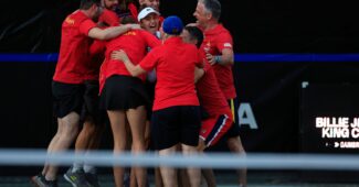 Team Romania celebrates in their Billie Jean King Cup qualifier