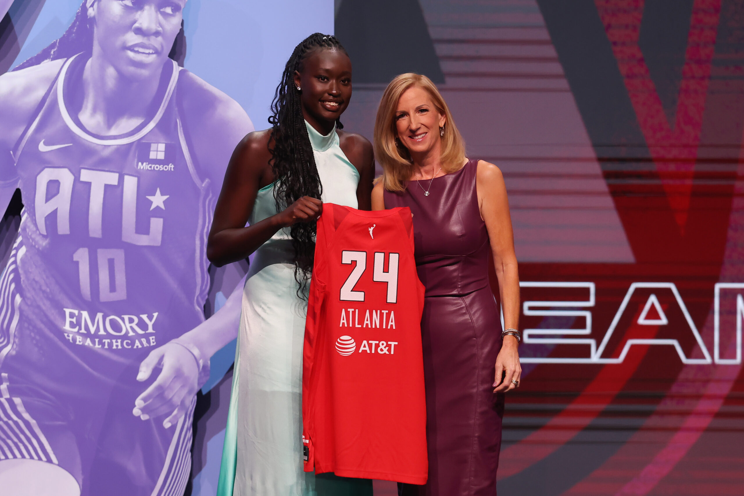 Nyadiew Puoch poses with WNBA commissioner Cathy Engelbert at the 2024 WNBA Draft