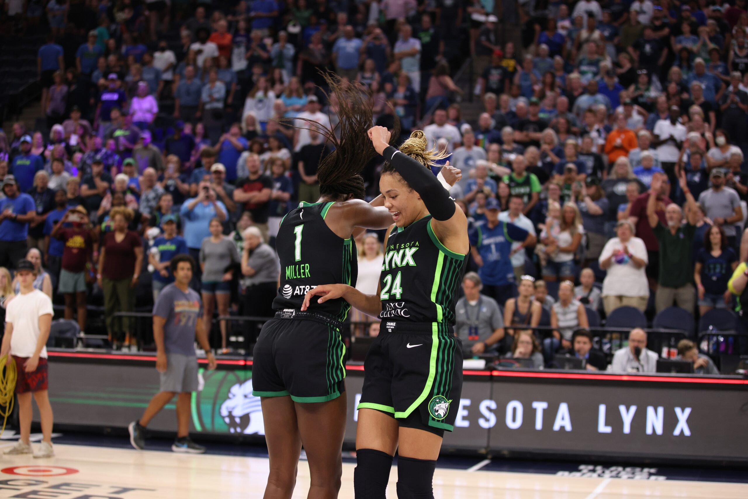MN Lynx vs Phoenix Mercury, Diamond Miller (F#1) & Napheesa Collier (F#24) celebrate victory final 2023 regular season home game, on September 3rd, 2023 at Target Center in Minneapolis, Minnesota (photo credit John McClellan)