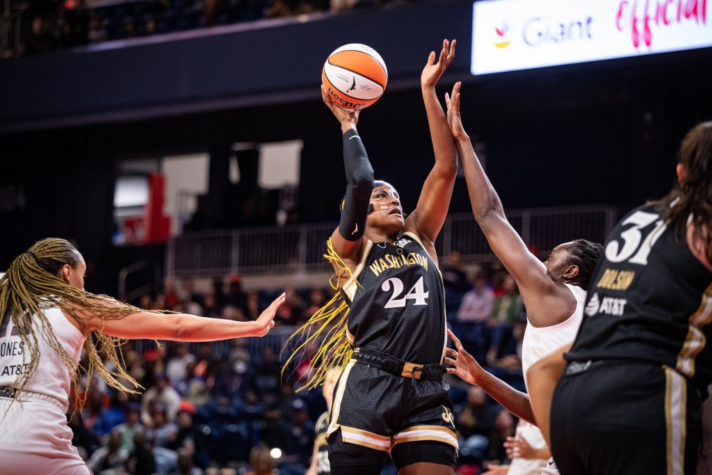 Washington Mystics forward Aaliyah Edwards shoots a right-handed hook shot. Atlanta Dream center <a rel=