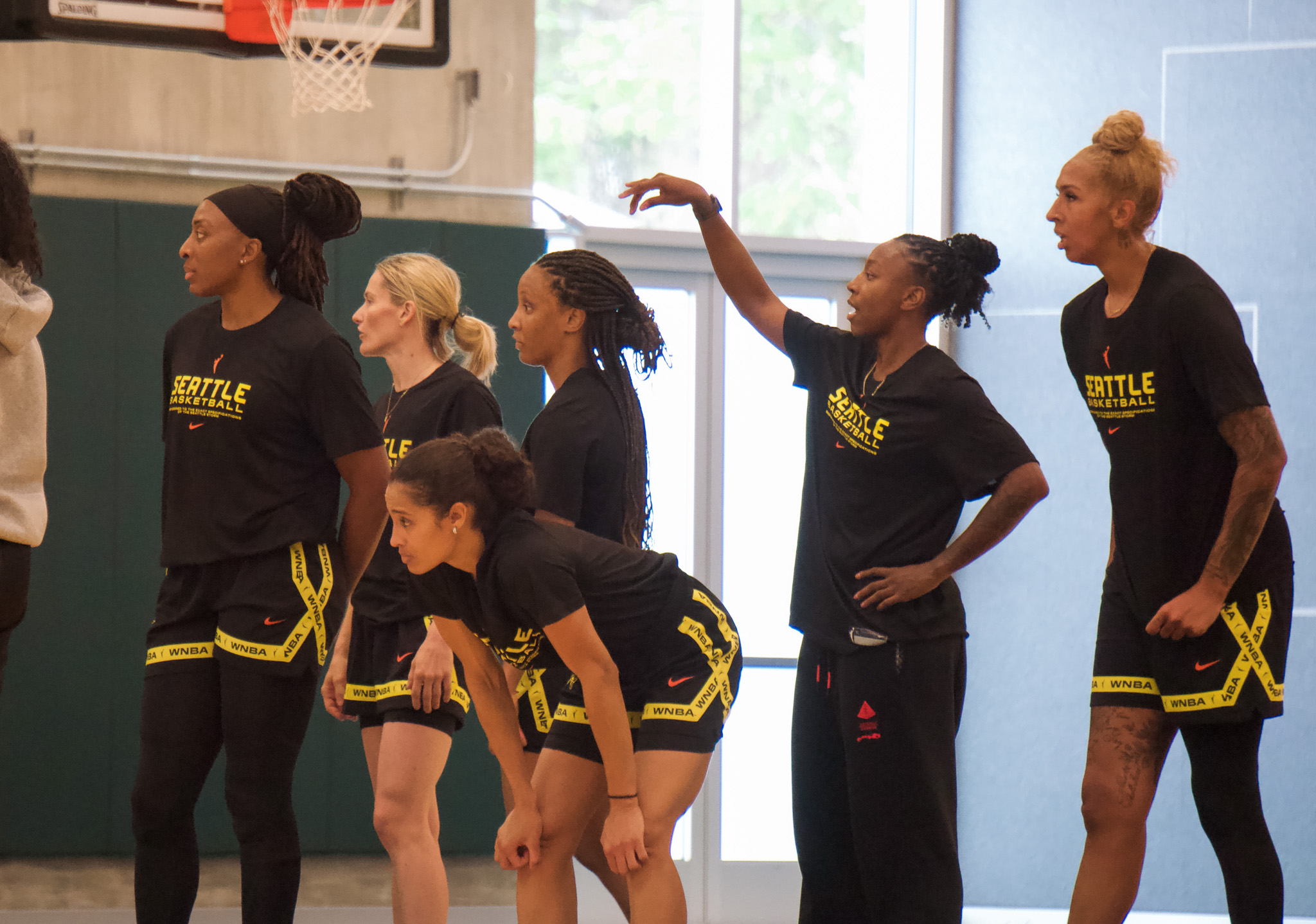 Nneka Ogwumike, Sami Whitcomb, Kiana Williams, Skylar Diggins-Smith, Jewell Loyd and Mercedes Russell stand and watch scrimmages at practice.
