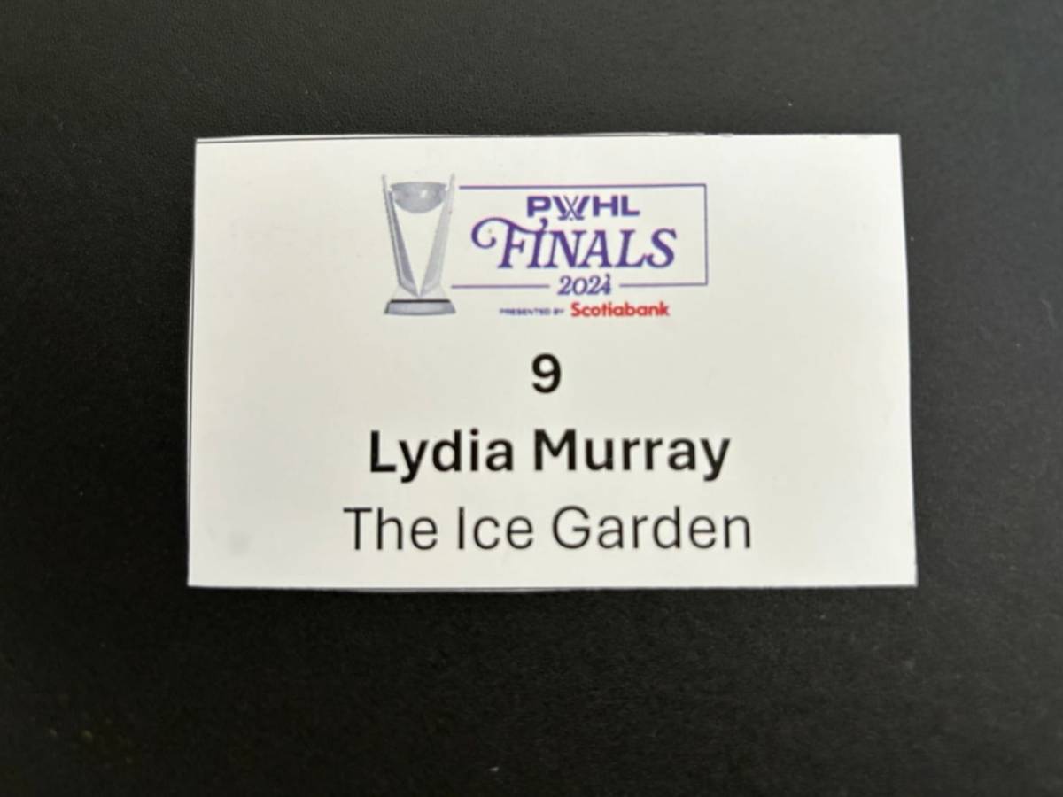 A small piece of paper with the PWHL Finals logo on it along with "Lydia Murray. The Ice Garden."