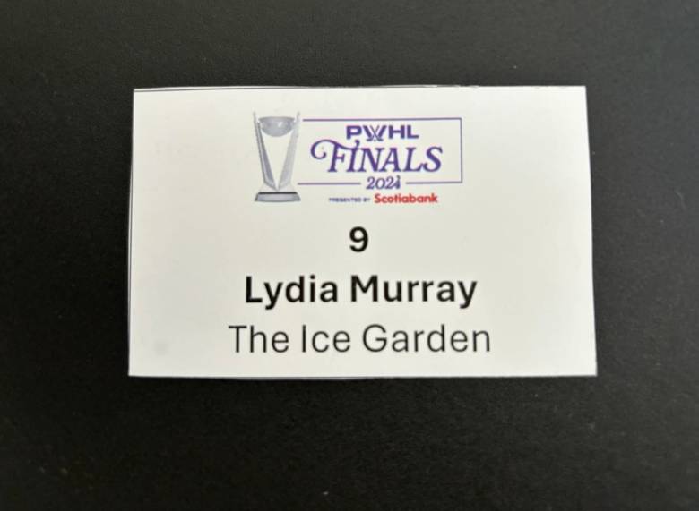 A small piece of paper with the PWHL Finals logo on it along with "Lydia Murray. The Ice Garden."