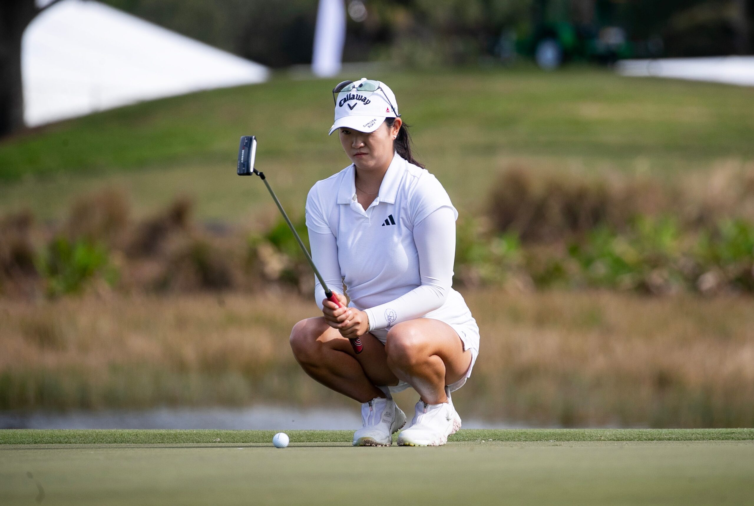 Rose Zhang lines up a putt on the 9th green at the Grant Thornton Invitational at Tiburon Golf Club in Naples, FL.