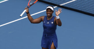 Sloane Stephens waves to the crowd after a match